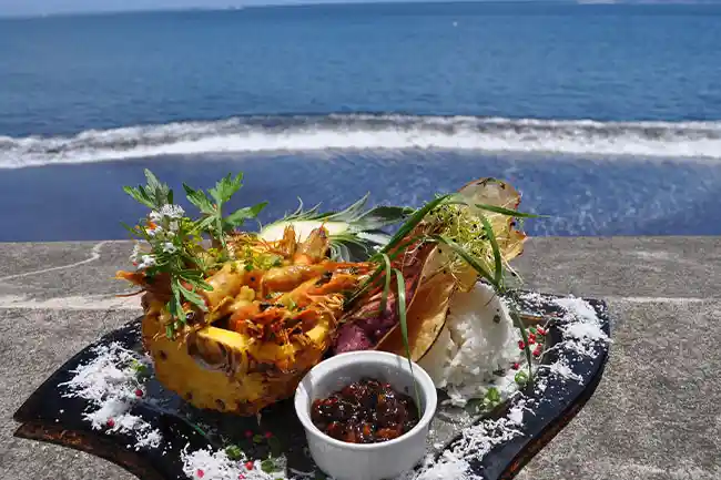 tahitian dish by the black sand beach at royal tahitien hotel