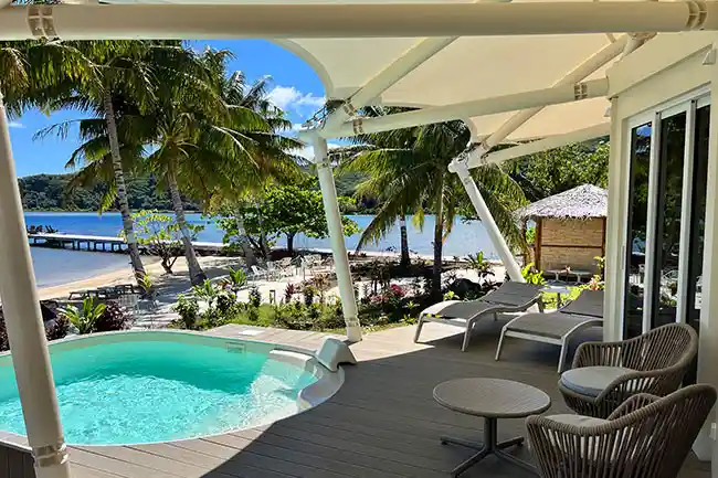 pool and terrace with ocean view at apatoa